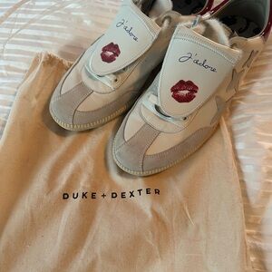 Duke + Dexter Women's Cream Sneakers with Red Accents